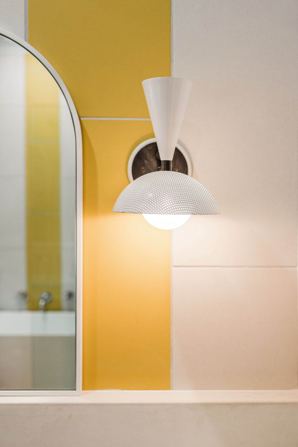 Molto Wall Sconce (Dark Bronze Enamel, Stark White)— Interior by Natalie Papier