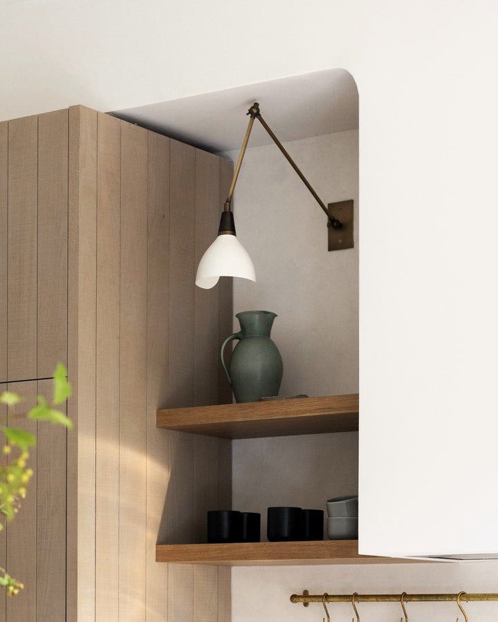 Torno Wall Lamp (Perfect White, Dark Bronze Enamel, Natural Brass) - Interior by the Brownstone Boys, Photo by Erin White
